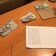 Фото пресс-центра ГКНБ . У членов религиозной организации обнаружили фальшивые $30 тысяч
