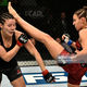Фото gettyimages.com. Антонина Шевченко (справа) в дебютном бою в UFC. Ноябрь 2018 года