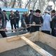 Фото пресс-службы мэрии. На месте строительства парка в северной части Бишкека заложили капсулу