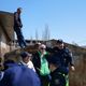 Фото 24-kg.com. Один из членов кооператива залез на крышу гаража, пытаясь предотвратить снос