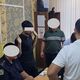 Фото пресс-службы МВД. Иностранец дал 10 тысяч сомов патрульному в здании УПСМ