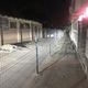 Фото читателя. Элитный дом решили огородить забором за счет проезжей части 