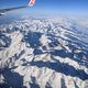 Фото Снимок во время перелета над горами